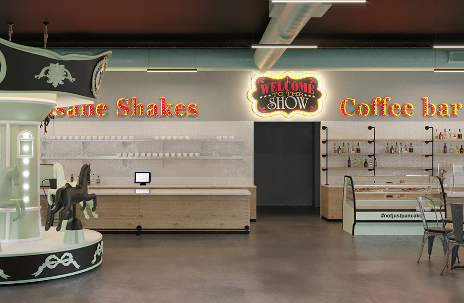 A coffee bar with a carousel and milkshakes
