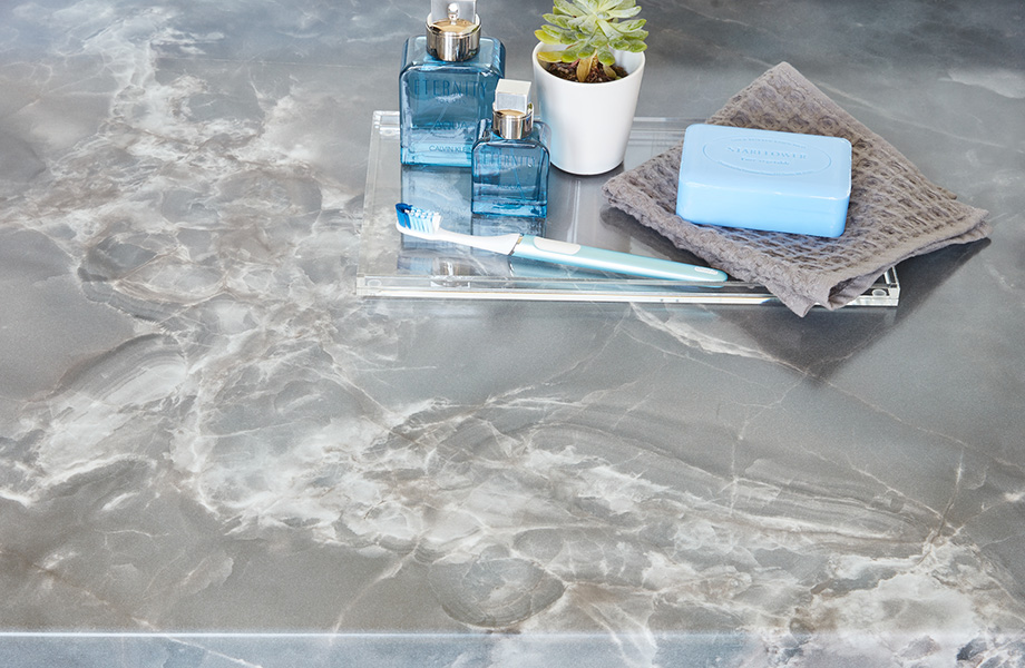 Smoke Onyx laminate bathroom vanity with toiletries