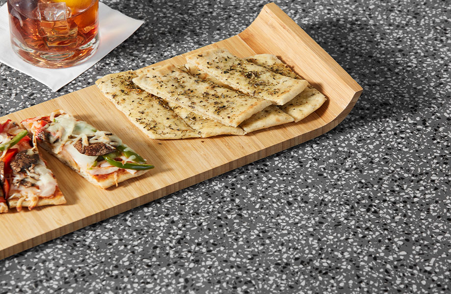 411 Grafite Terrazzo Matrix Restaurant table with appetizers and drinks