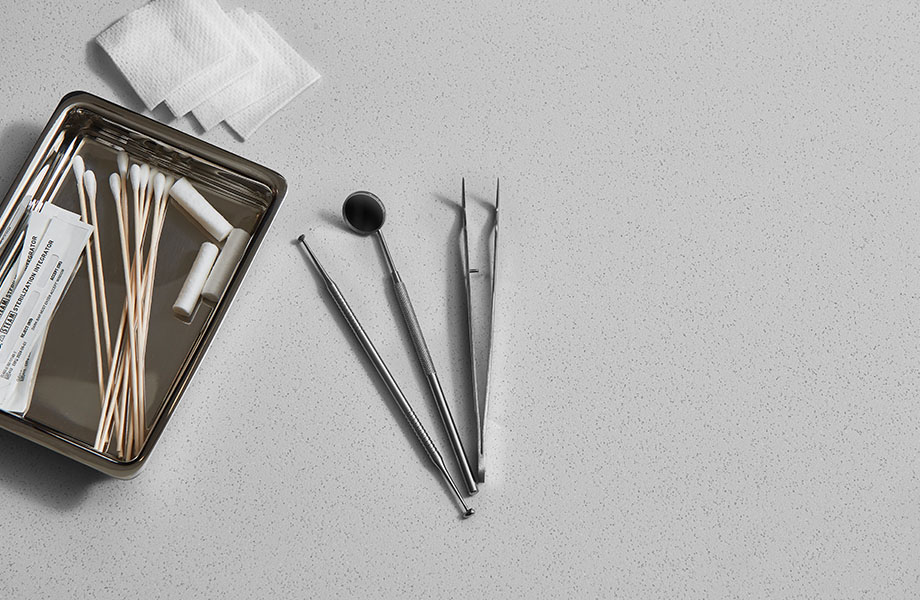 416 Luna Pewter gray solid surface countertop with dental tools 