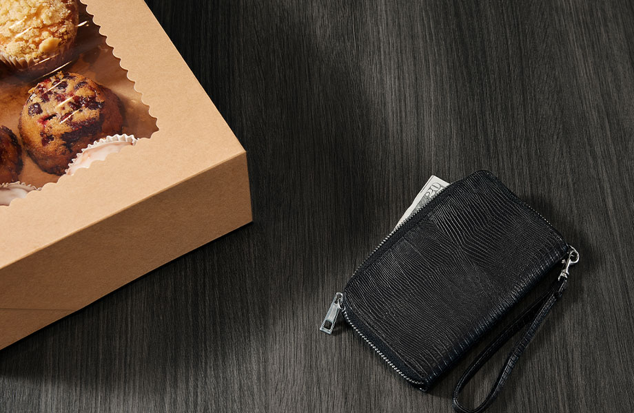 5792-PG Inked Oak wood surface checkout counter with baked goods and wallet