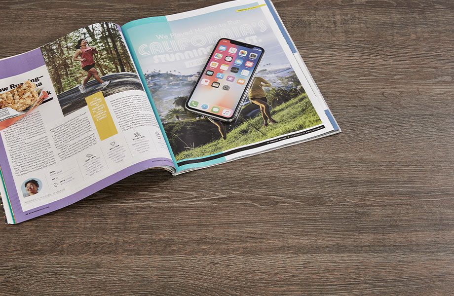 8589-PG Tula Oak woodgrain countertop laminate with magazine and phone